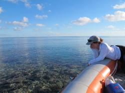 An AIMS volunteer diver gets a close look at the flat of Reef 19-138 on a calm day. If only it was possible to bottle weather like this!