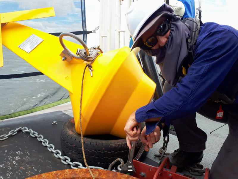 Instrument technician preparing Fitzroy mooring on ship