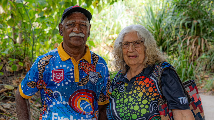 Two traditional owners pose for the camera