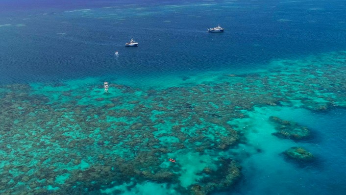 Aeiral view of clam tropical sea with AIMS vessels