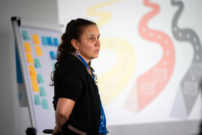 Dr Cass Hunter presenting in a meeting