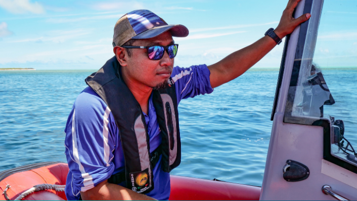 Muhammad Azmi Abdul Wahab on a boat on the Great Barrier Reef