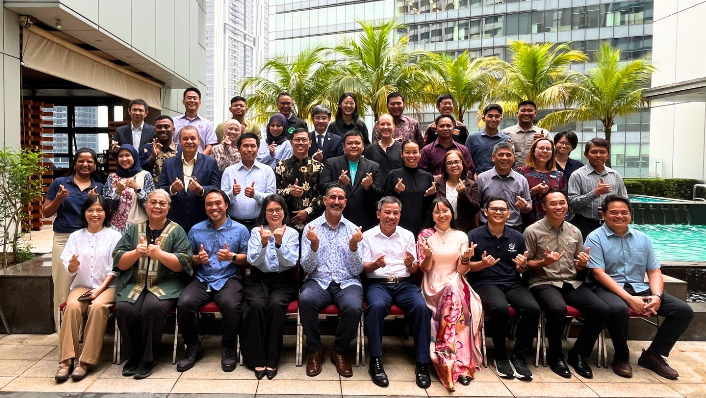 Delegates pose for group shot in Kuala Lumpur, Malaysia