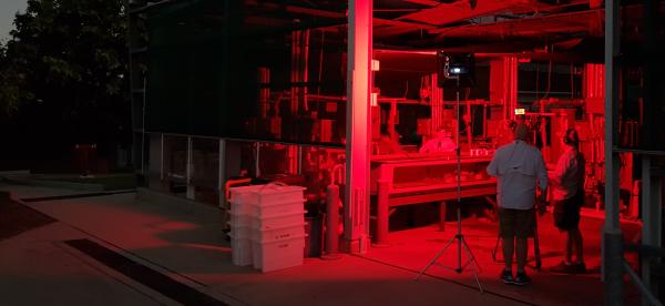 seasim and tv crew under red light