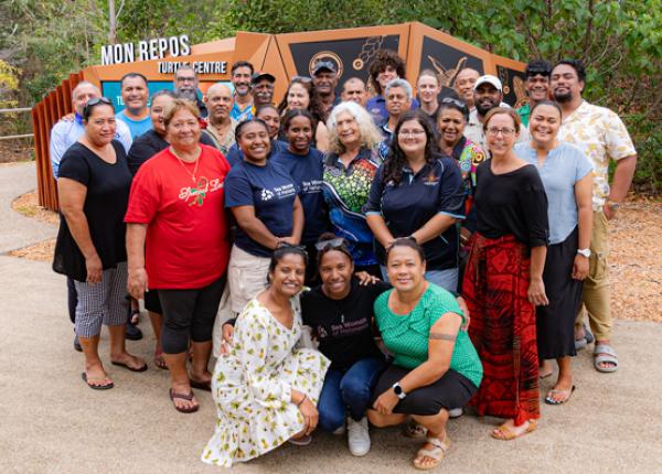 A group stand infront of Mon Repos Turtle centre
