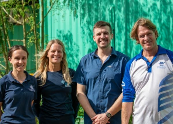 Four scientists from AIMS and SECORE post for a photo