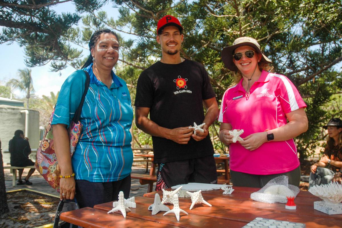 AIMS scientists with Traditional Owner with reef shapes