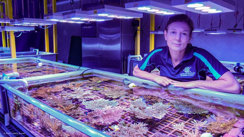 Madeleine van Oppen next to coral tank