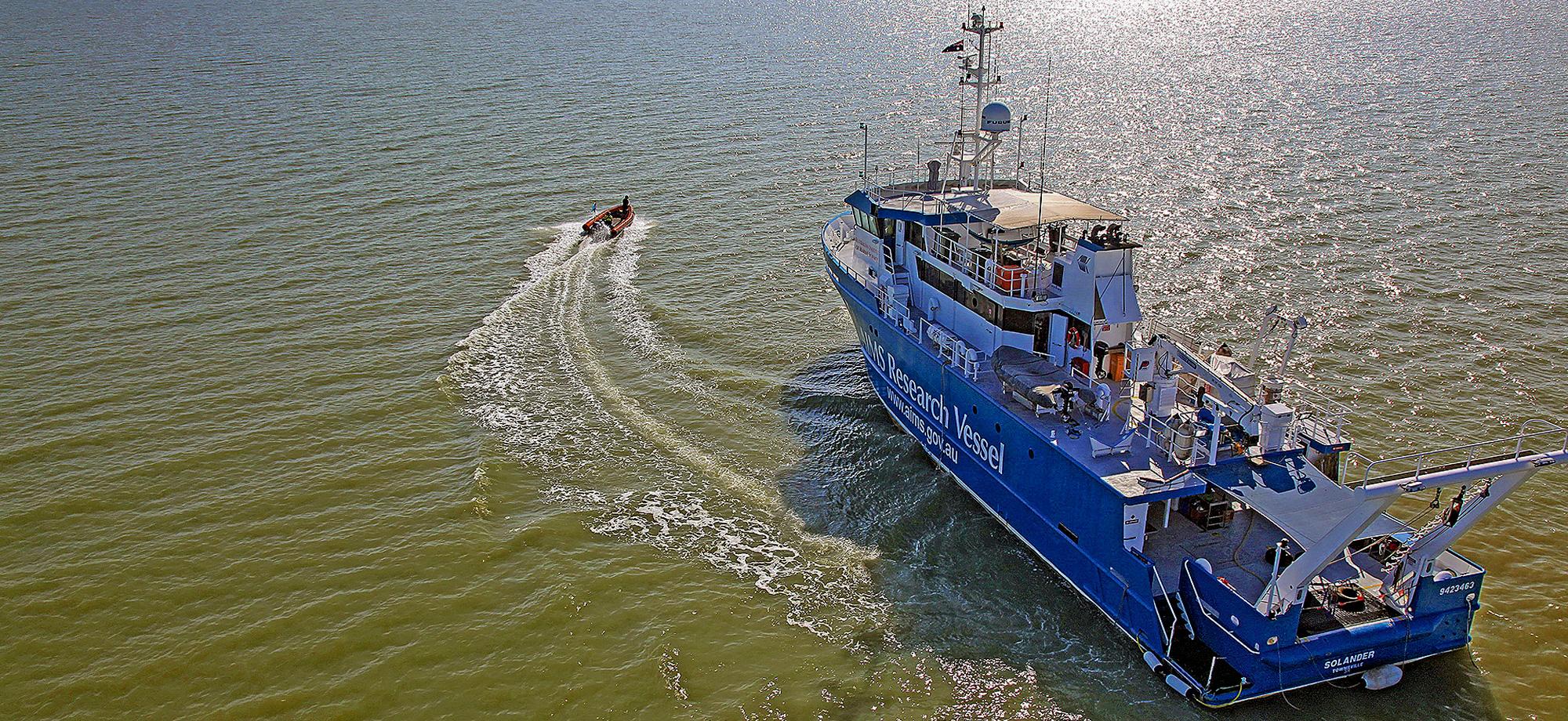 research vessel in water which appears muddy
