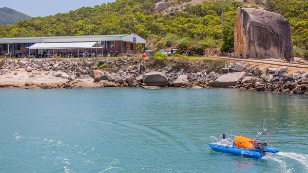 Autonomous vessel turns towards marine operations, a building on the foreshore at the Australian Institute of Marine Science