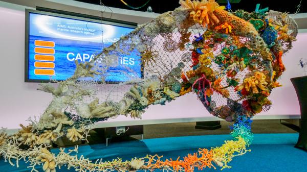 Triton shell art installation made by ghost nets