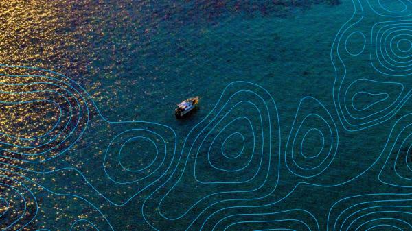 Boat on golden ocean overlaid by contour pattern