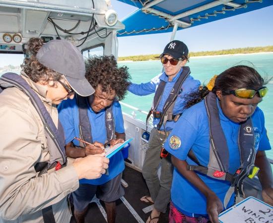 AIMS researchers and Anindilyakwa Land and Sea Rangers on a research vessel