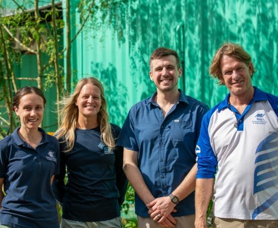 Four scientists from AIMS and SECORE post for a photo